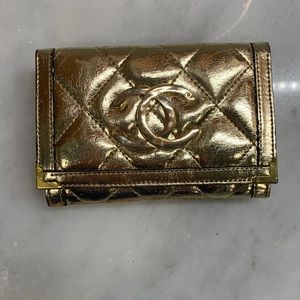 Gold leather wallet.